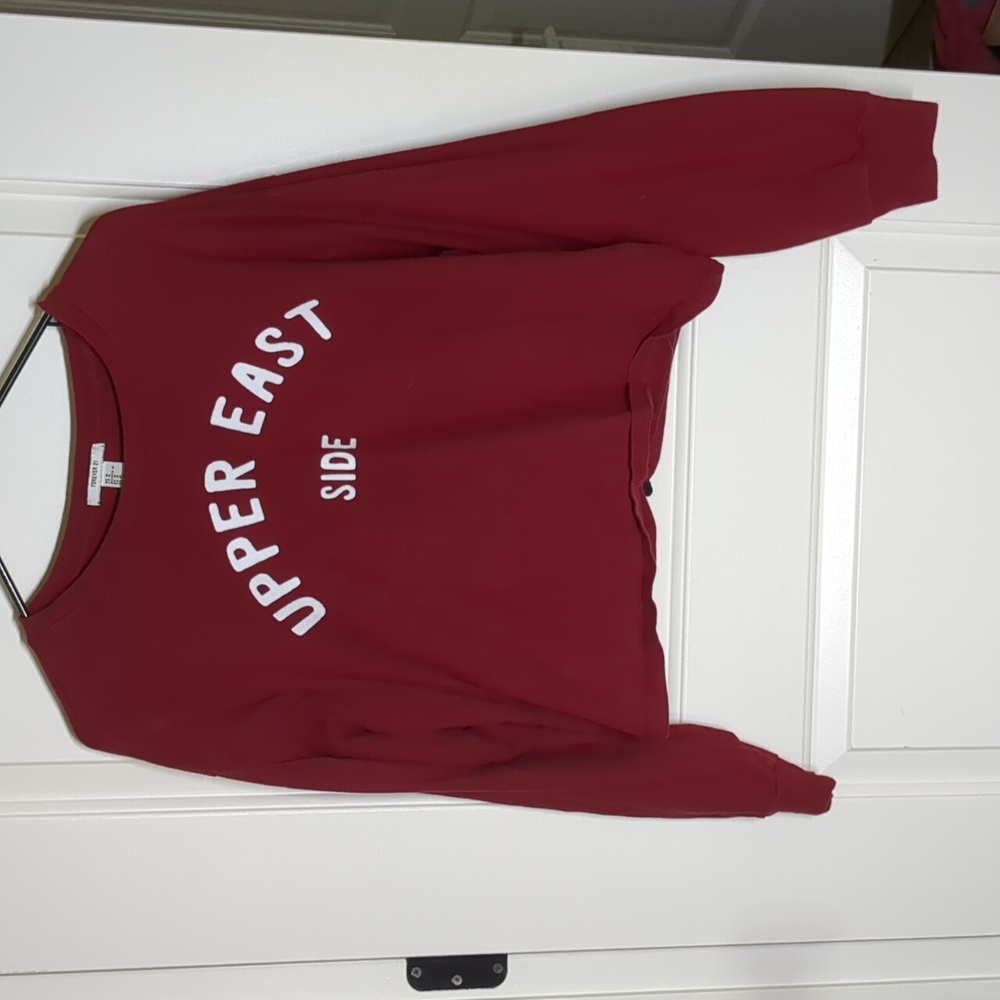 Red "upper East side" cropped long sleeve T-shirt
